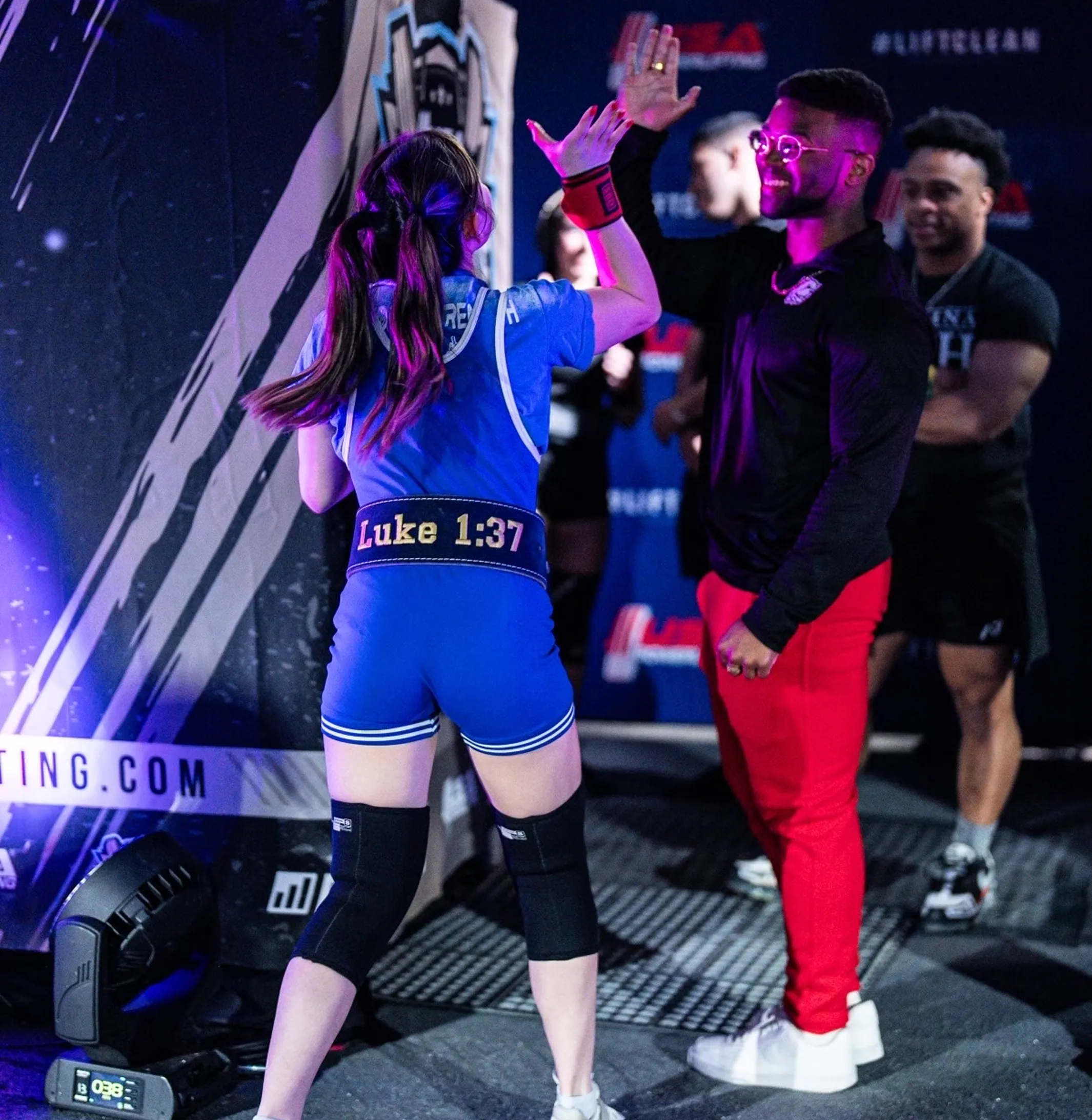 Personal trainer demonstrating proper exercise form