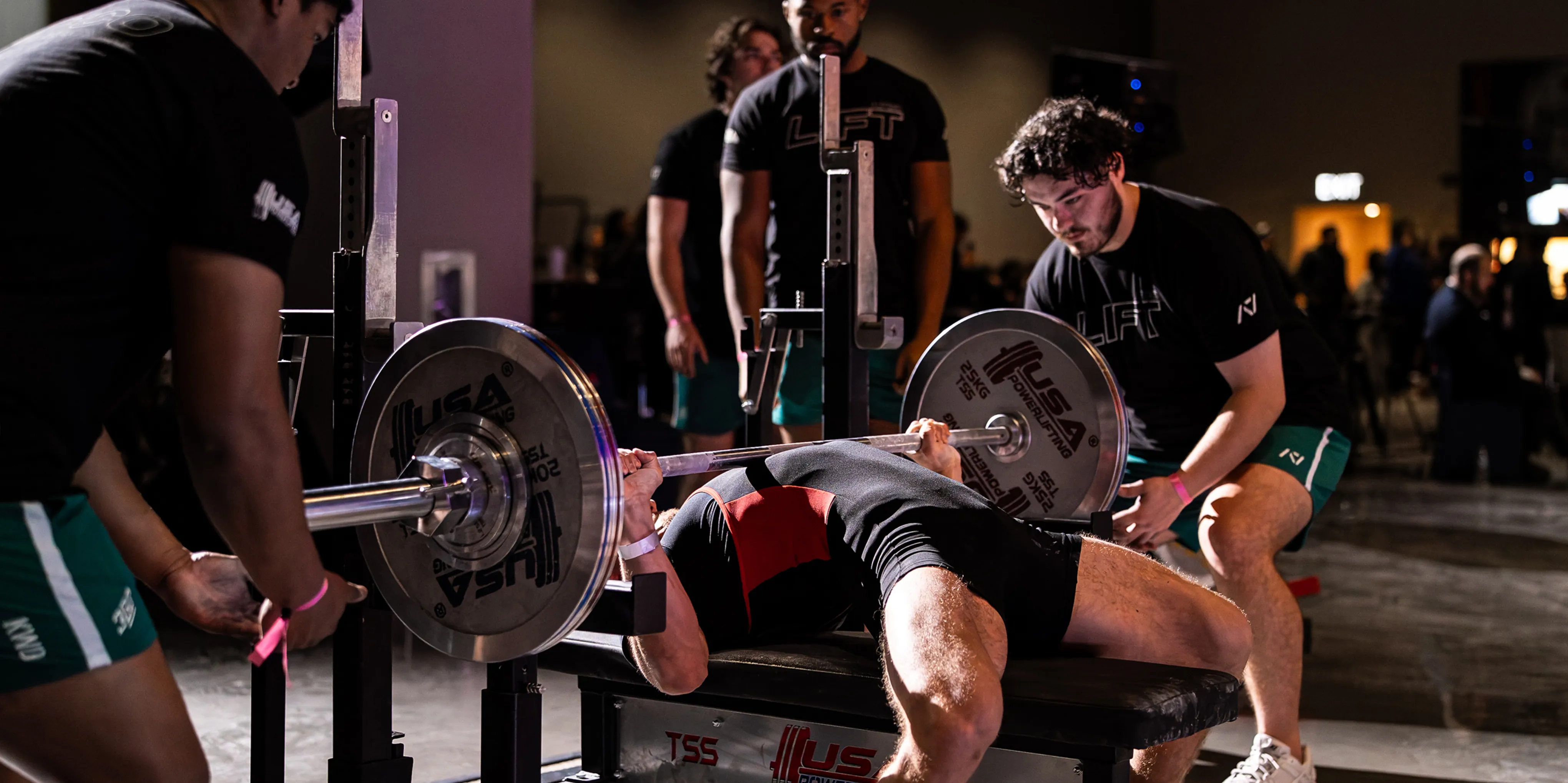 Personal trainer working with client in gym